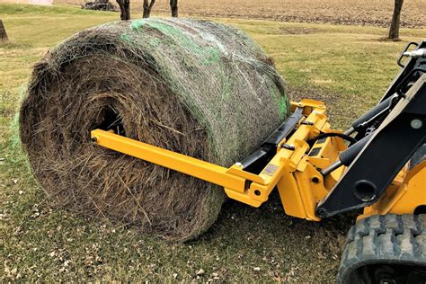 skid steer hay unroller|bale unroller for cattle.